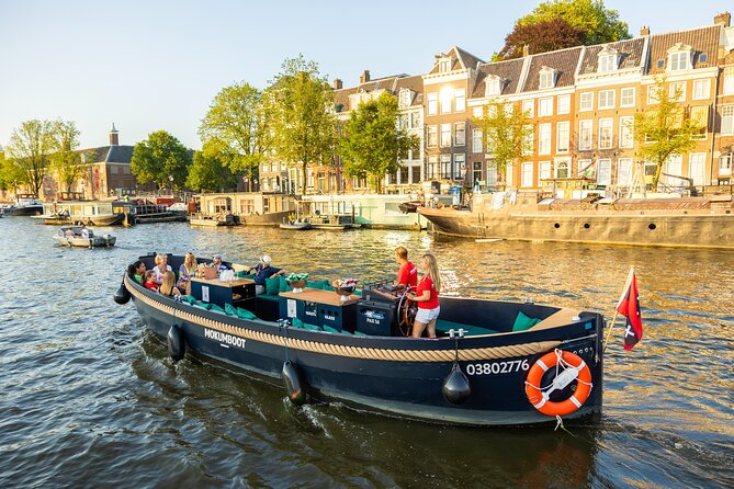 Amsterdam: Guided Open Boat Canal Cruise Unlimited Drinks Option - Museumplein, the Concertgebouw, and Amsterdam’s music scene