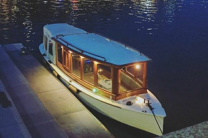 Amsterdam Highlights Canal Cruise with a Drink - Old Town architecture from water level