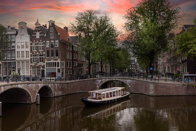 Amsterdam Historic Tour On Classic Saloon Boat - Passing beneath the Skinny Bridge