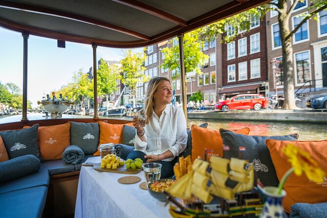 Amsterdam Historic Tour On Classic Saloon Boat - A church, the Opera, and the changing city center