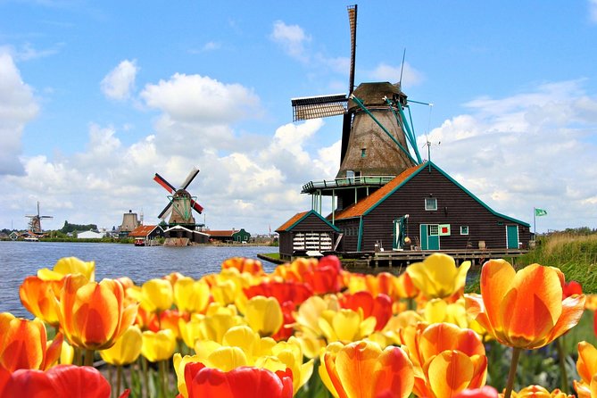 Amsterdam: Keukenhof and Zaanse Schans Windmills Guided Day Trip - Adding the one-hour Amsterdam canal cruise