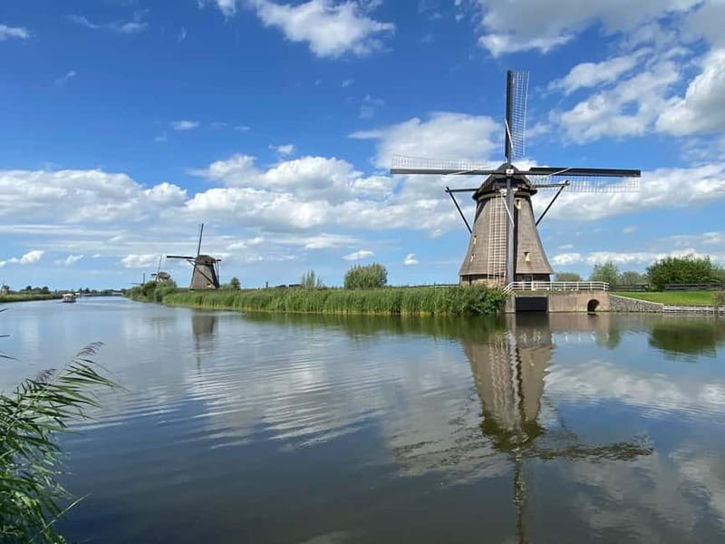Amsterdam: Kinderdijk, Euromast, Delft and Den Haag Day Tour - Kinderdijk’s 19 original windmills
