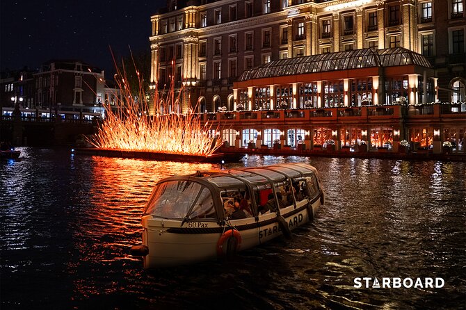 Amsterdam: Light Festival Cruise with Unlimited Drinks Option - The guides are the heart of the experience