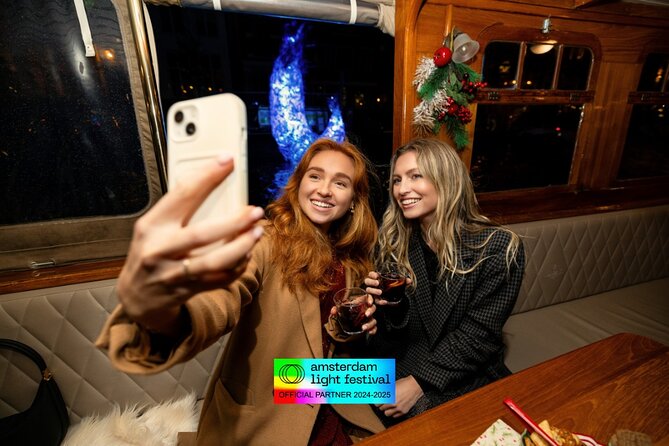Amsterdam Light Festival: Heated Boat Cruise + Hot Drinks & Bite - The covered boat: warm, cosy, and sometimes too warm