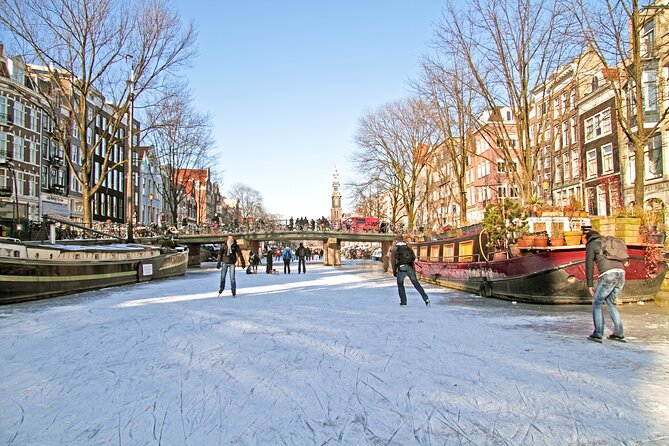 Amsterdam Light Festival Winter Walk with Stroopwafel Workshop - Begijnhof offers a quieter pause