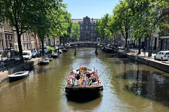 Amsterdam Luxury Boutique Boat tour with Unlimited Beer and Wine - De Wallen from the canal