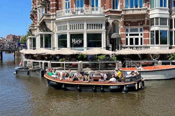 Amsterdam Luxury Boutique Boat tour with Unlimited Beer and Wine - Oude Kerk, Amsterdam’s oldest church