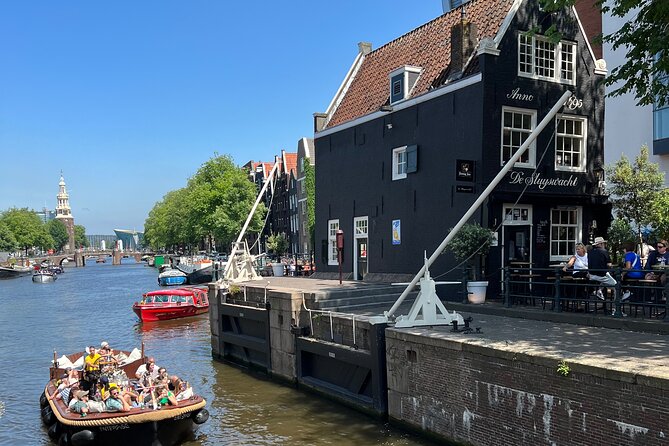 Amsterdam Luxury Boutique Boat tour with Unlimited Beer and Wine - Guide quality makes or breaks the ride