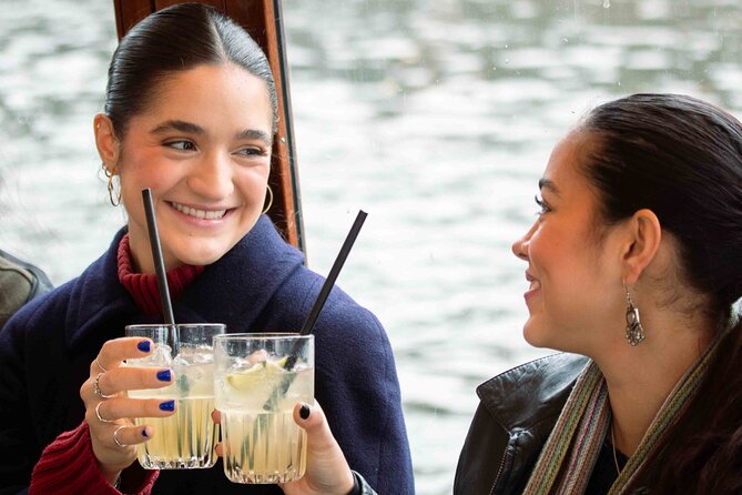 Amsterdam: Luxury Saloon Boat Cruise with Cocktails & Waffle - Central Station and the maritime waterfront