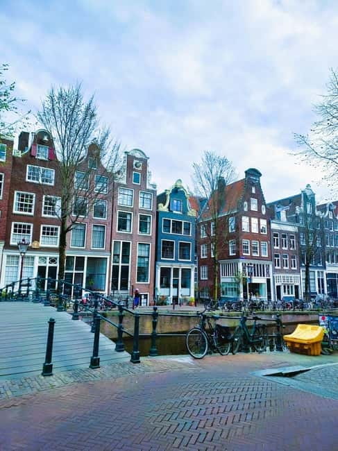 Amsterdam: Off the Beaten Path Bike Tour in French - Entrepotdok and the northern side of the route