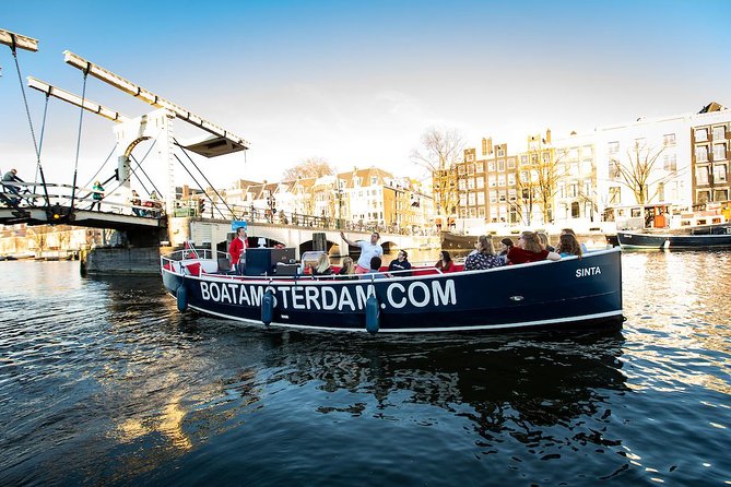 Amsterdam Open Boat Cruise in Old City Center with Live Guide - Seeing Amsterdam from an open electric boat