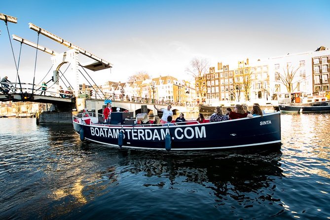 Amsterdam Open Boat Cruise with Live Guide and Two Drinks - Jordaan, Westerkerk, and the Anne Frank House area