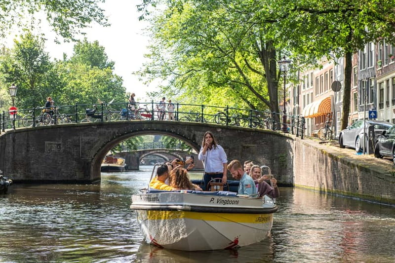 Amsterdam: Open Boat Tour of Canals with Expert Local Guide - Why an open boat is a smart way to see Amsterdam
