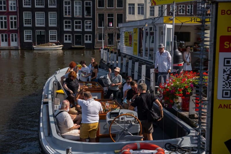 Amsterdam: Open Boat Tour of Canals with Expert Local Guide - Starting at Damrak, Rijksmuseum, or Prins Hendrikkade