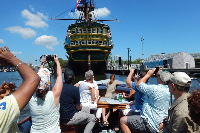 Amsterdam Open Boat Tour with Local Guide - Passing beneath the Bridge of Love