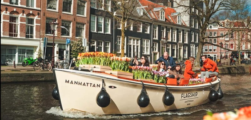 Amsterdam: Premium Tulip Boat Canal Tour - The first canal views and photo opportunities
