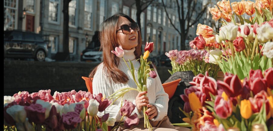 Amsterdam: Premium Tulip Boat Canal Tour - What rain changes on the water