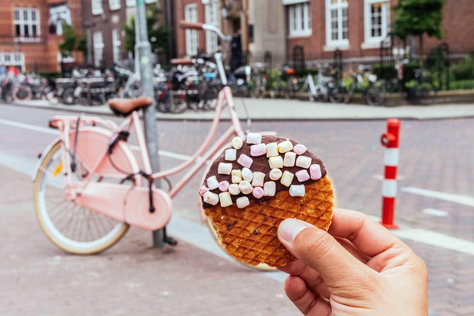 Amsterdam PRIVATE Bike Tour With Locals: Bike & Local Snack Included - Key details that shape the ride