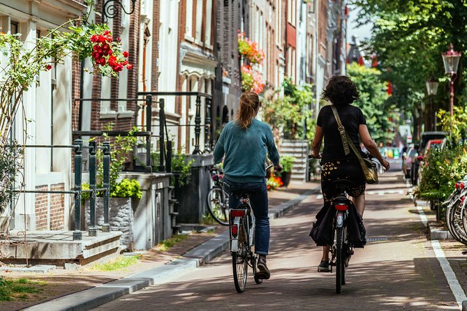 Amsterdam PRIVATE Bike Tour With Locals: Bike & Local Snack Included - What the Local Snack Adds