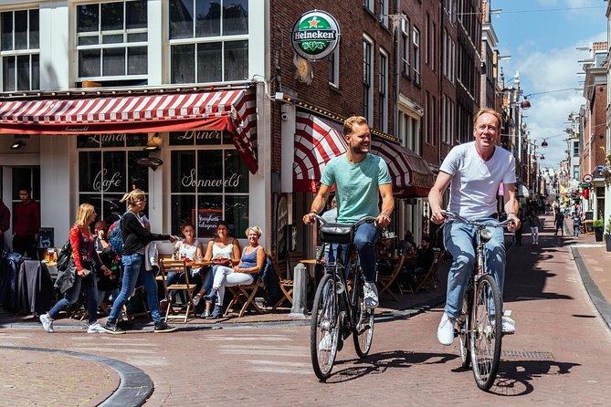 Amsterdam PRIVATE Bike Tour With Locals: Bike & Local Snack Included - Westerkerk and the Jordaan Canals
