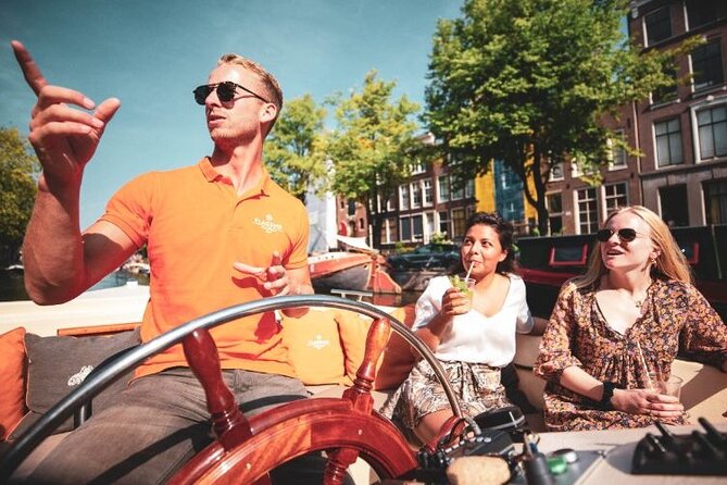 Amsterdam Private Boat Tour with Unlimited Drinks - Westerkerk, the Amstel, and Amsterdam’s bridge views