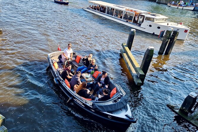 Amsterdam Private Canal Cruise – 90 Minutes through the Old City - Zuiderkerk, Munttoren, and the Edge of De Wallen