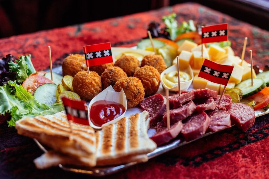 Amsterdam: Private Food Tour with a Local - Dutch classics: stroopwafel, bitterballen, and herring