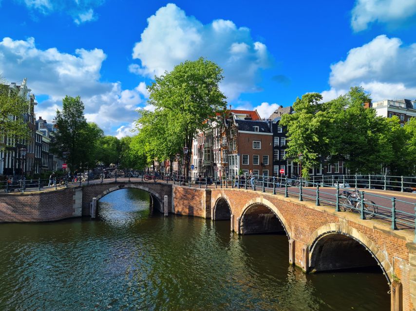 Amsterdam: Private Pedicab Historical Sightseeing Tour - Dam Square explains where Amsterdam began
