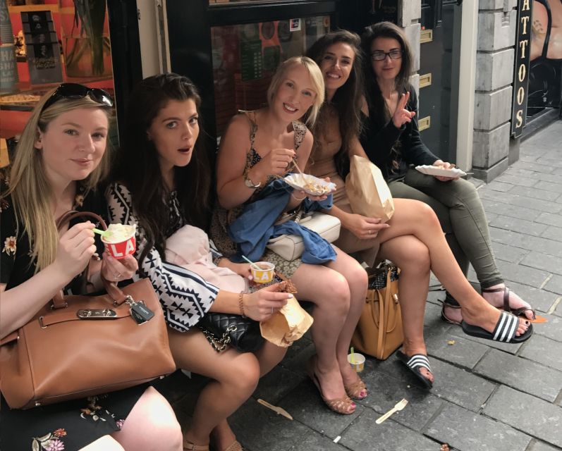 Amsterdam: Private Red Light District and Food Tour - Oude Kerk: old Amsterdam beside modern nightlife