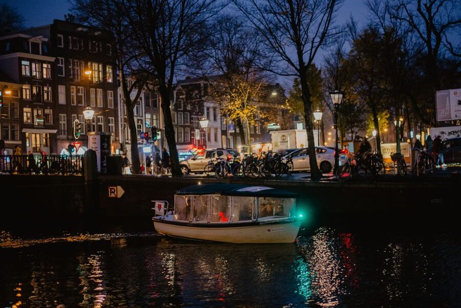 Amsterdam: Private Romantic Evening Boat Tour with Prosecco - Rain or Shine on a Covered Boat