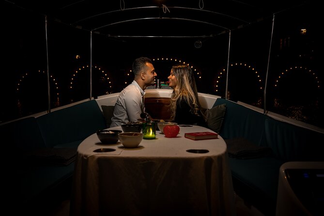 Amsterdam: Private Romantic Evening Canal Cruise + Bubbles/Snacks - The smallest house and a canal-side curiosity