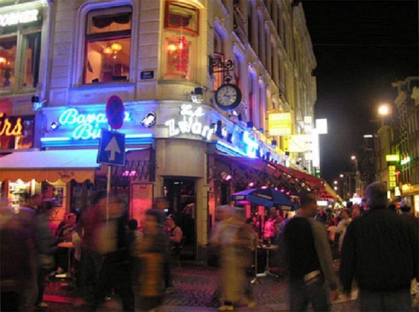Amsterdam: Red Light District and Local Pub Tour - Oude Kerk and Warmoesstraat: the historic core