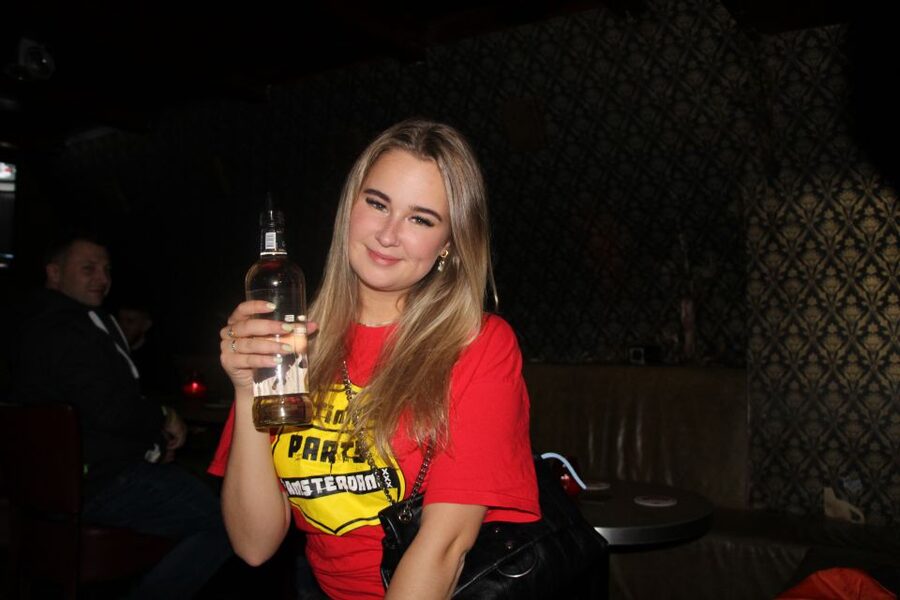 Amsterdam: Red-Light District Pub Crawl and Booze Boat Tour - The 8:00 PM shot session and first bar