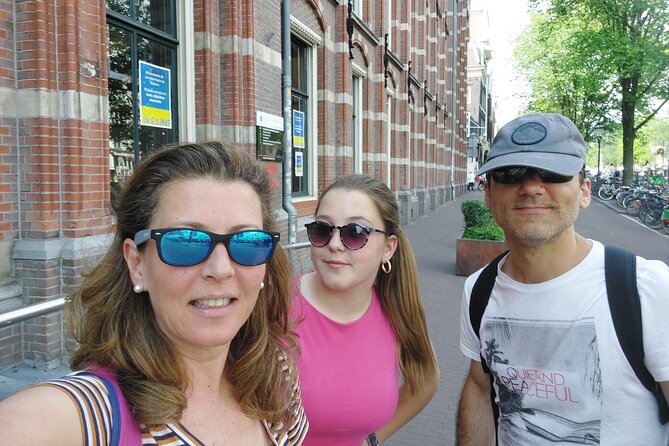 Amsterdam Red Light District Treasure: Self-Guided Tour & Quest - Reading Nieuwmarkt through De Waag and wartime memory