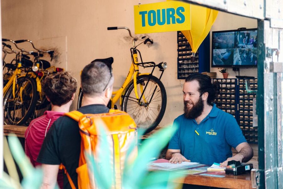 Amsterdam: Relaxed City Highlights Guided Bike Tour - Canal-ring houses and Amsterdam’s small surprises