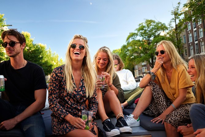 Amsterdam: Saloon Boat Cruise + Unlimited Drinks & Bite option - What the guiding is really like