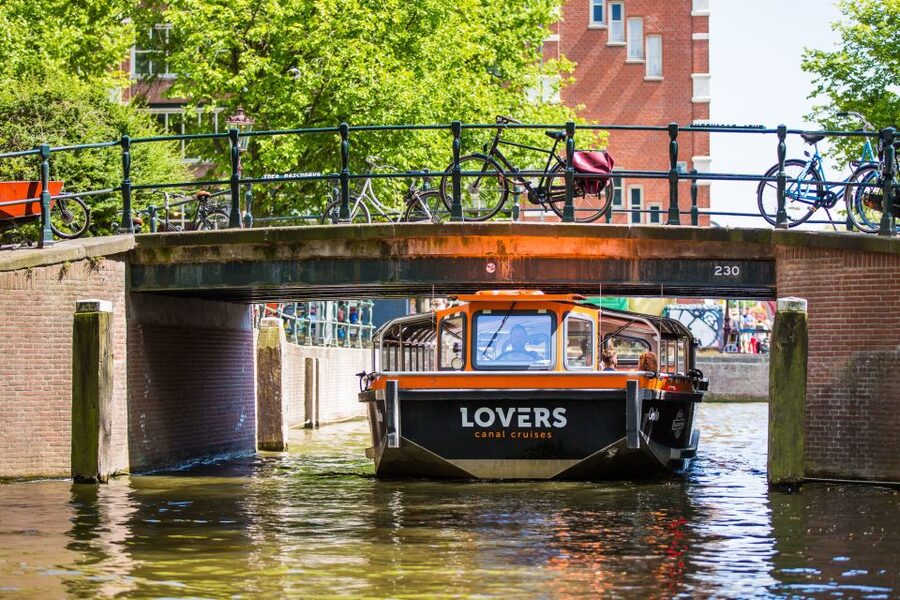 Amsterdam: Semi-Open Canal Boat Cruise - A calm hour on Amsterdam’s canals