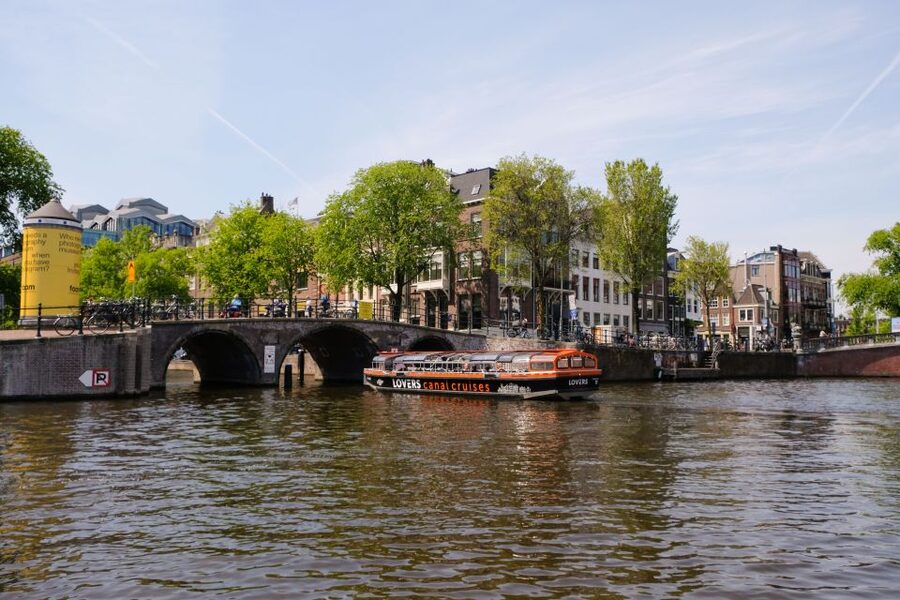 Amsterdam: Semi-Open Canal Boat Cruise - Starting at Amsterdam Centraal Station
