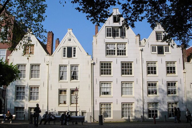 Amsterdam Sightseeing Tour + Hidden Gems + Tastings + PDF guide - Bloemenmarkt and the Munttoren connection