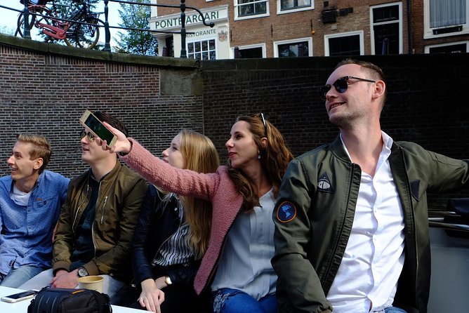Amsterdam Small-Group Canal Cruise Including Snacks and Drinks - Jordaan, Westertoren, and the Anne Frank House
