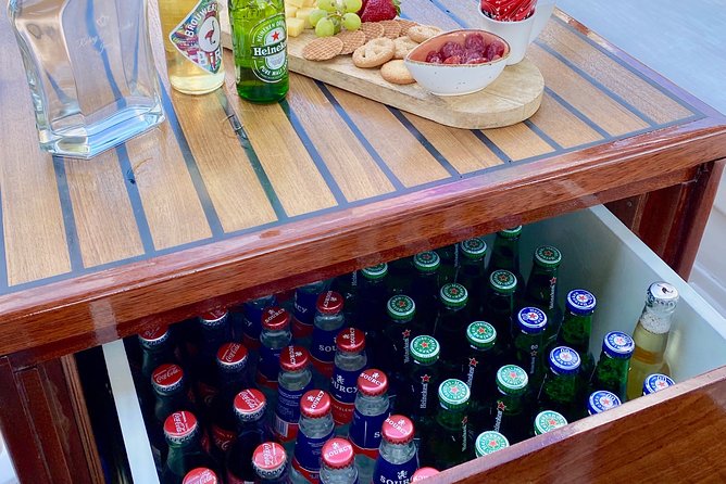 Amsterdam Small-Group Canal Cruise Including Snacks and Drinks - Along the Amstel and toward the Red Light District