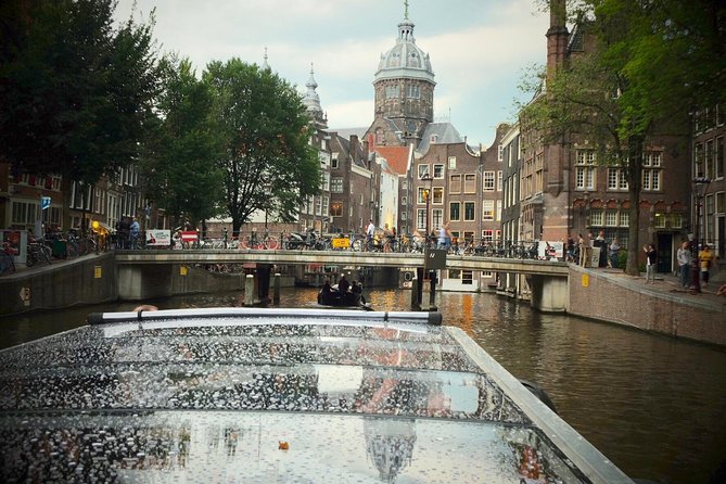 Amsterdam Small-Group Canal Cruise Including Snacks and Drinks - How the captains affect the two-hour ride
