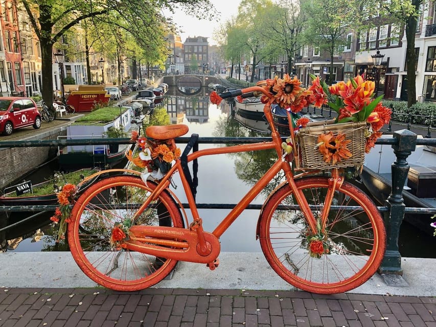 Amsterdam: Small Group Walking Tour with Fun Guide - From Fishing Village to Global City