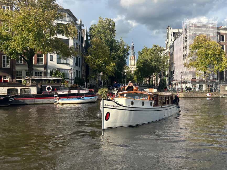 Amsterdam: The Bulldog Boat Smoke and Booze Cruise - Boarding a half-open Amsterdam canal boat