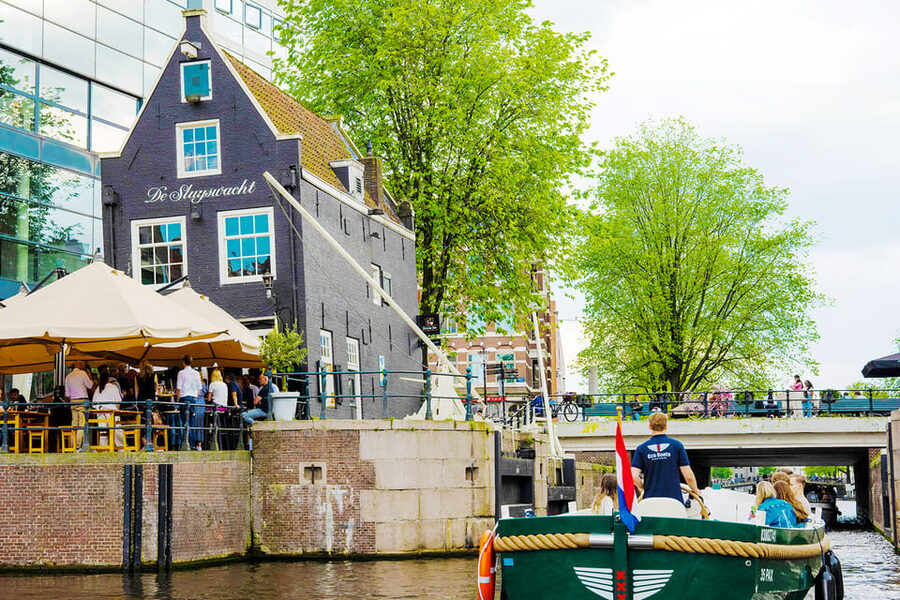 Amsterdam: The Newest Canal Cruise with Drink Option - Basilica of Saint Nicholas and the old harbor