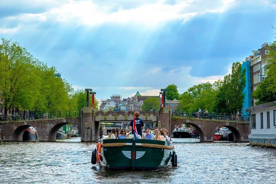 Amsterdam: The Newest Canal Cruise with Drink Option - Dancing Houses, Oude Kerk, and the Red Light District