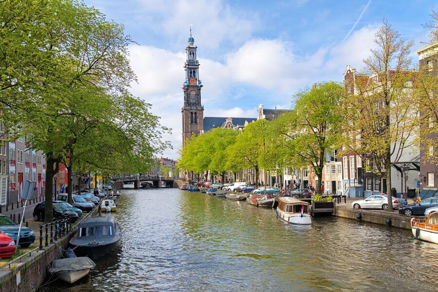 Amsterdam Walking Tour and Canal Cruise - Street markets add a taste of everyday Amsterdam