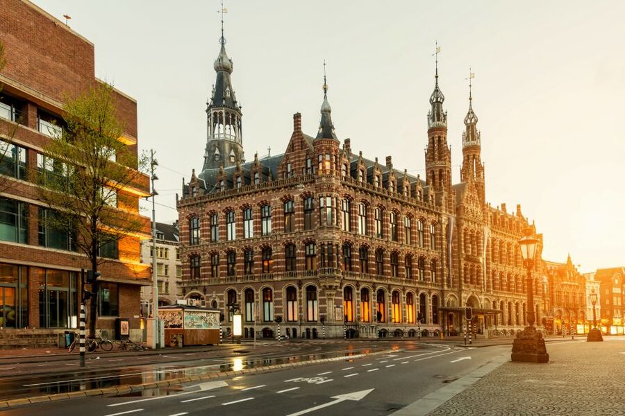 Amsterdam Walking Tour and Canal Cruise - The canal cruise changes the scale of the city