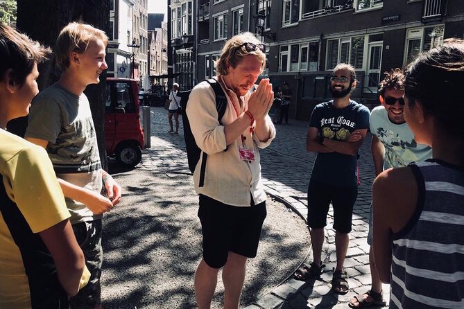 Amsterdam Walking Tour with a local comedian as guide - Grimburgwal and Amsterdam’s canal traditions