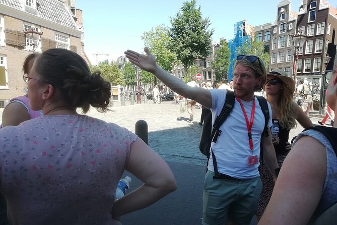 Amsterdam Walking Tour with a local comedian as guide - Spui after crossing the Kalverstraat